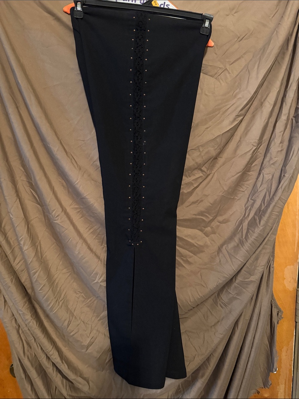 Black pants with slit at the bottom
